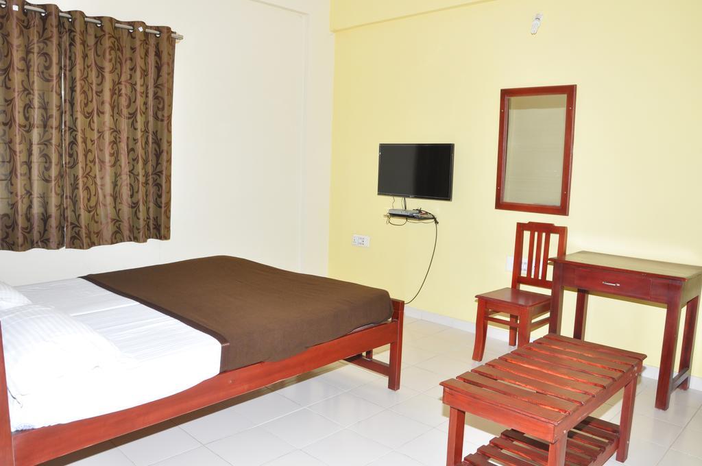 Vega Residency Otel Bangalore Oda fotoğraf