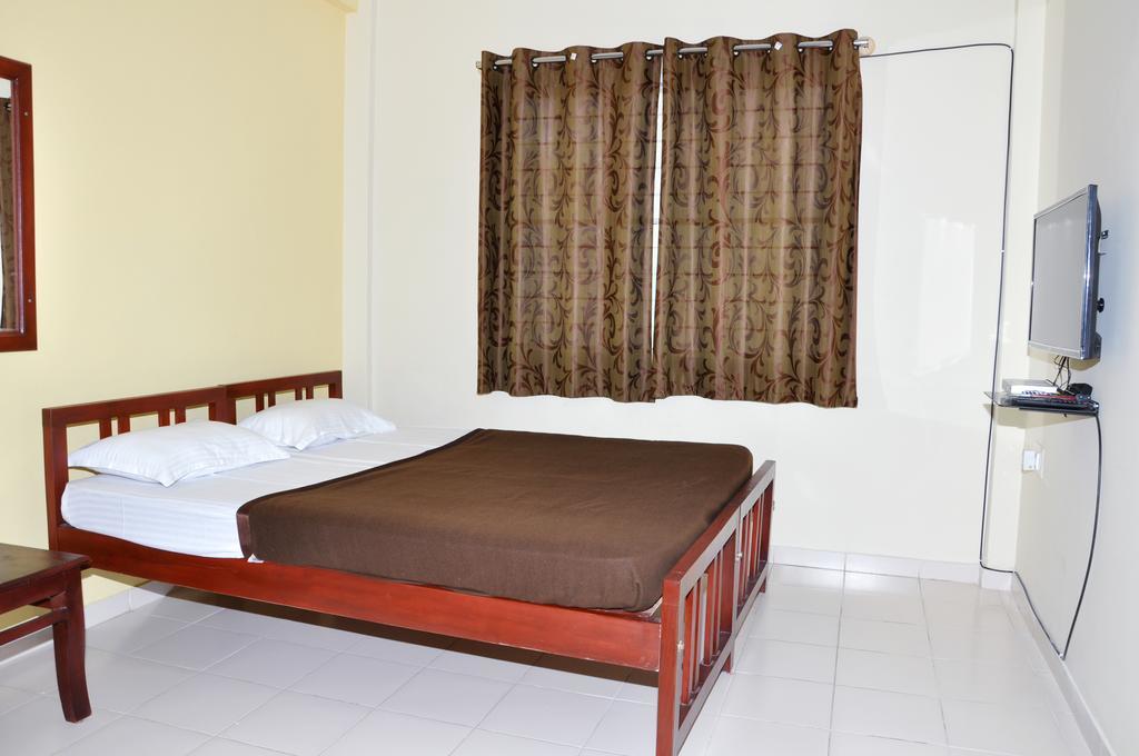Vega Residency Otel Bangalore Oda fotoğraf